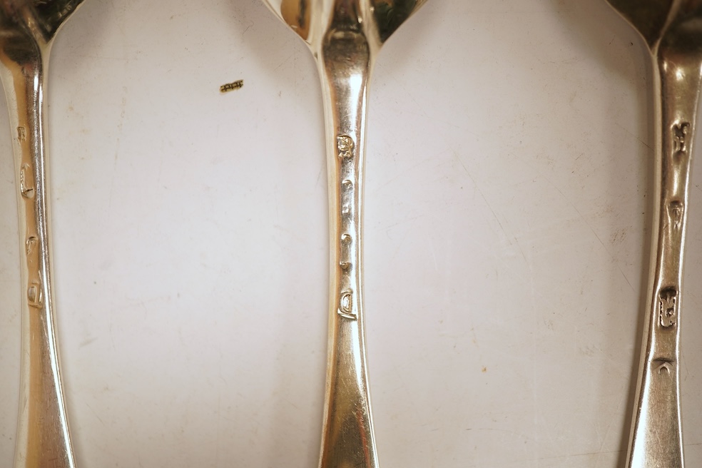 A matched set of seven Queen Anne silver Hanoverian pattern dessert spoons, maker's mark rubbed, five London, 1708, 17.5cm, together with seven other silver base mark Hanoverian pattern dessert spoons, various dates and